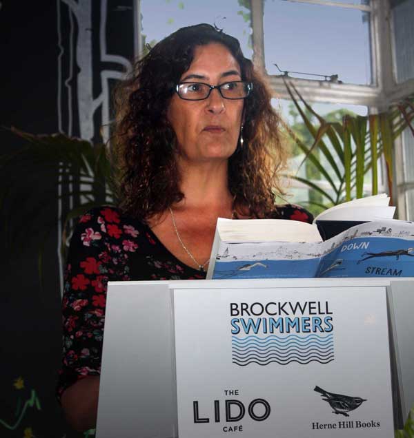 Caitlin reading at the Lido Cafe