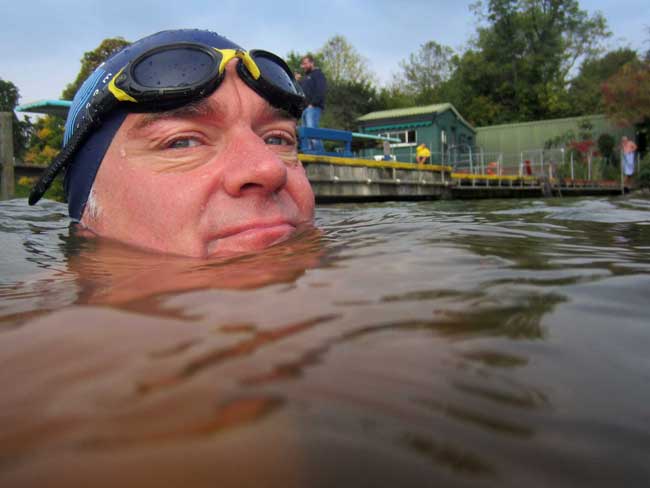 Brockwell Lido Swimmer Tim Sutton enjoying the waters of the Hampstead Mens Ponds